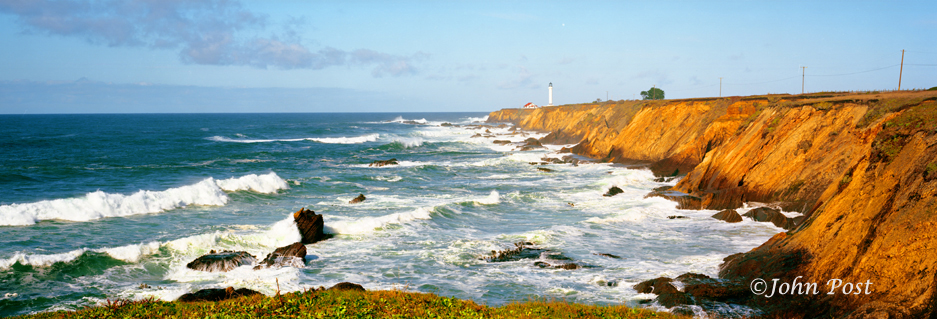 Coastal veiw of cliffs ocean & lighthouse