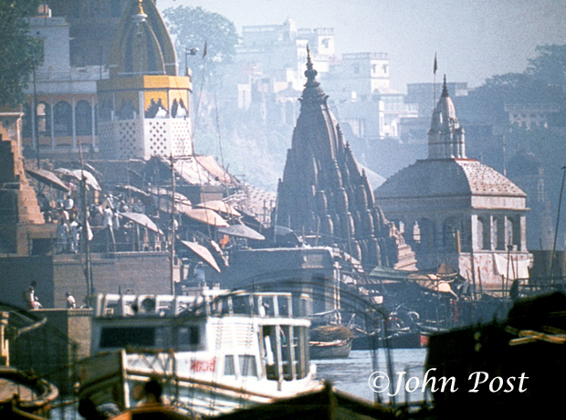 India, Varanasi, Night view of pyers and fires at burning ghats