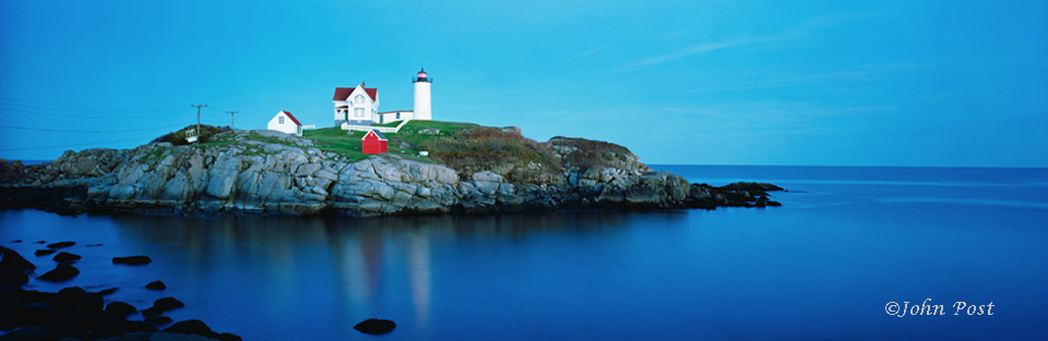 Twilight view of lighthouse on small island